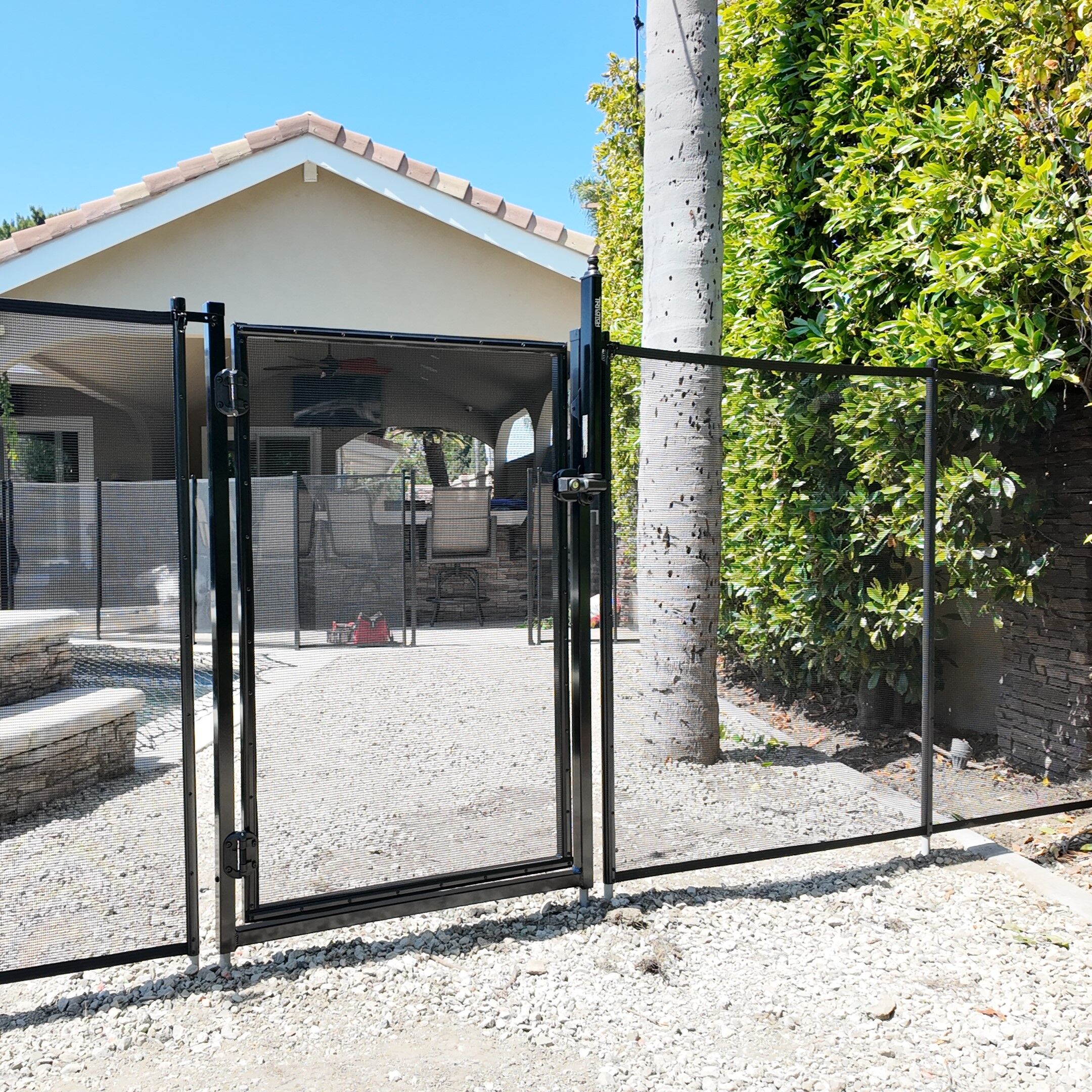 Pool Fence with Gate Pool Fence Installed in Dirt with a Gate Kit