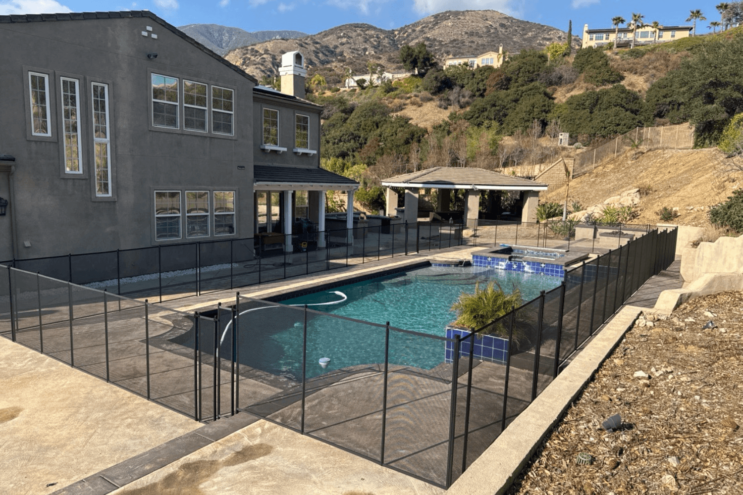 large mesh removable pool fence large home with a backyard pool that has a removable pool fence installed