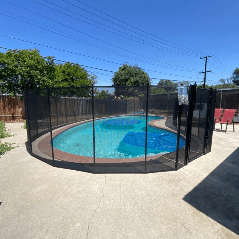 black mesh pool fence surrounding an irregular shaped pool black mesh pool fence surrounding an irregular shaped pool